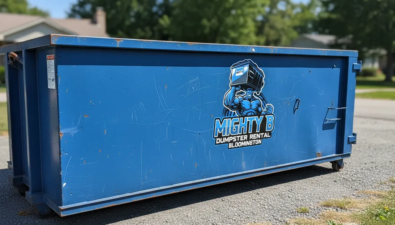 Roll-off dumpster positioned beside a house for a shingle tear-off in Bloomington